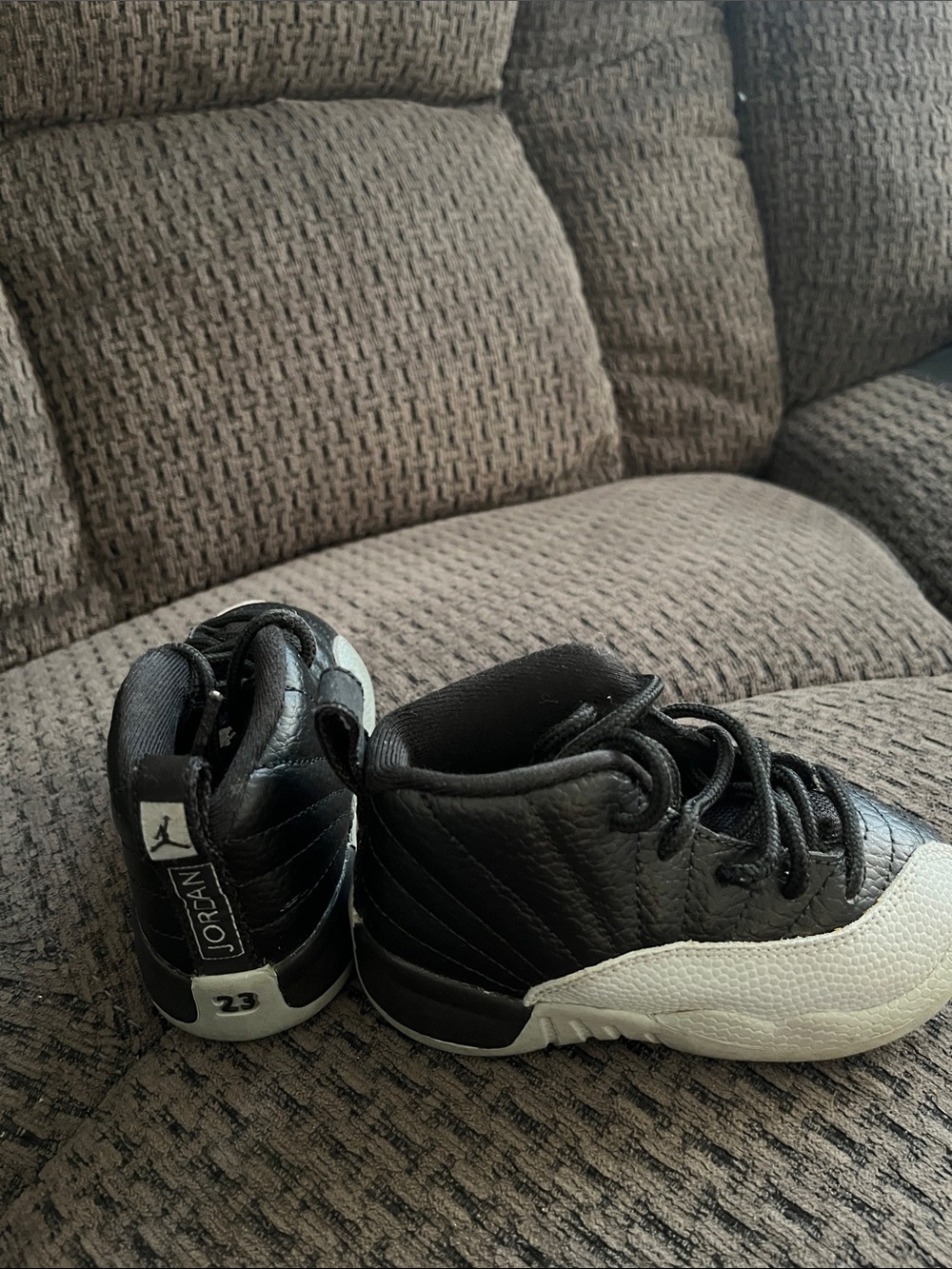 Jordan Kids Black and White High-Top Sneakers